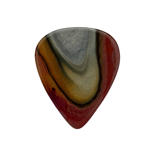 Red, yellowish-gray handmade stone guitar pick on white background
