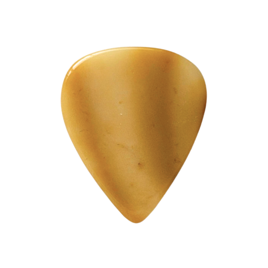 A handmade stone guitar pick with a smooth, polished amber-brown finish, isolated on a solid white background.