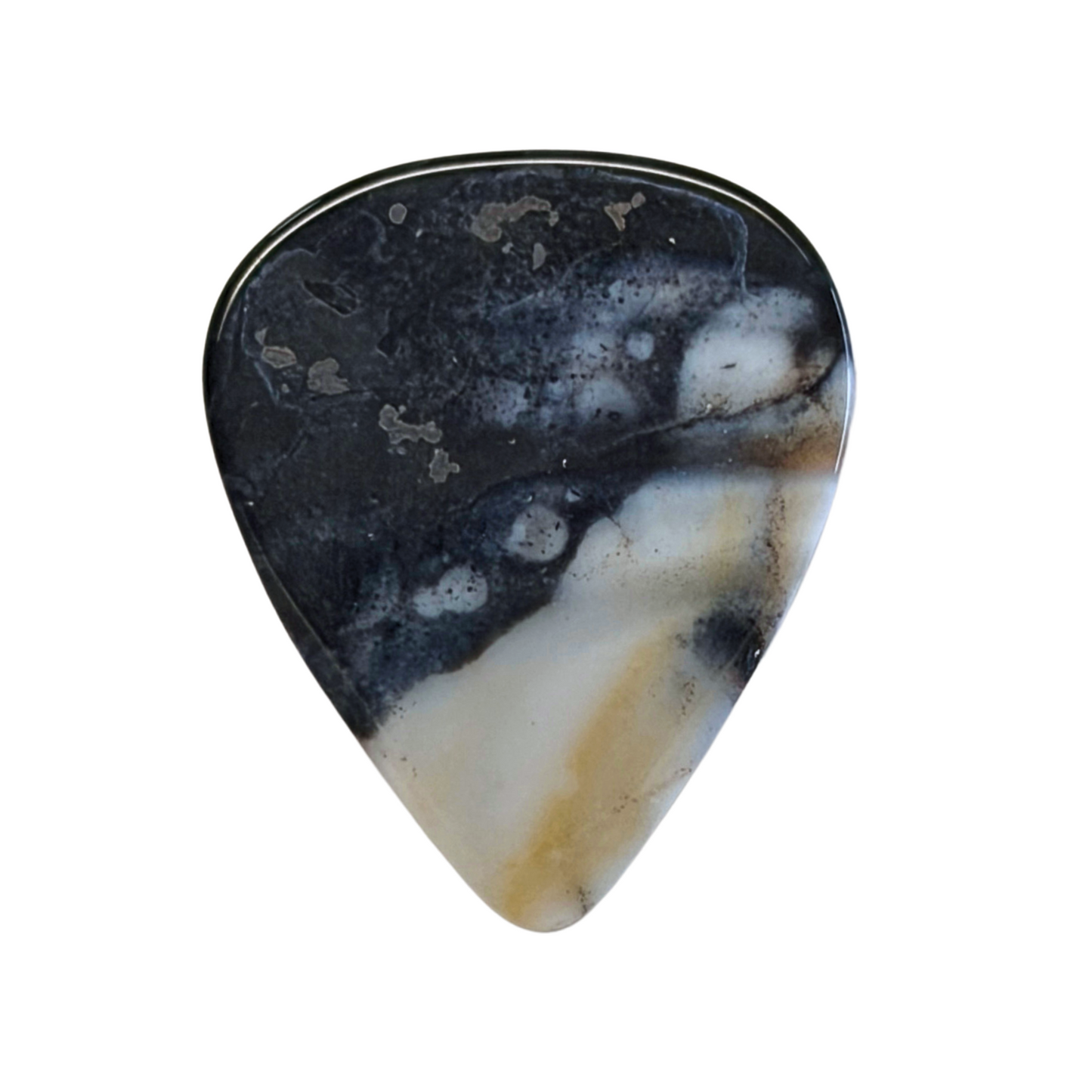 black and white handmade stone guitar pick on white background