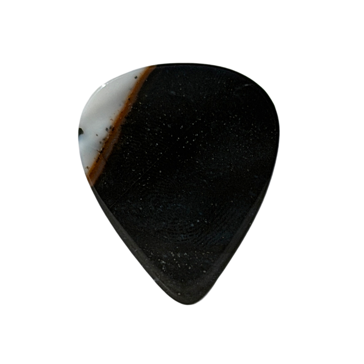 A standard stone guitar pick with a polished black surface speckled with tiny white flecks, featuring a natural white and brown stone inlay along the upper right edge, shown on a solid white background.
