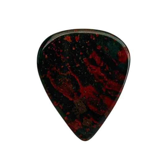 dark green and red handmade stone guitar pick on white background