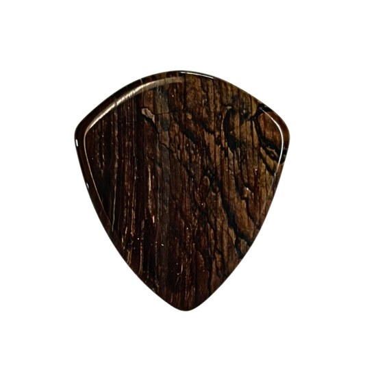 A single stone guitar pick with a dark brown wood grain pattern, shown against a plain white background.