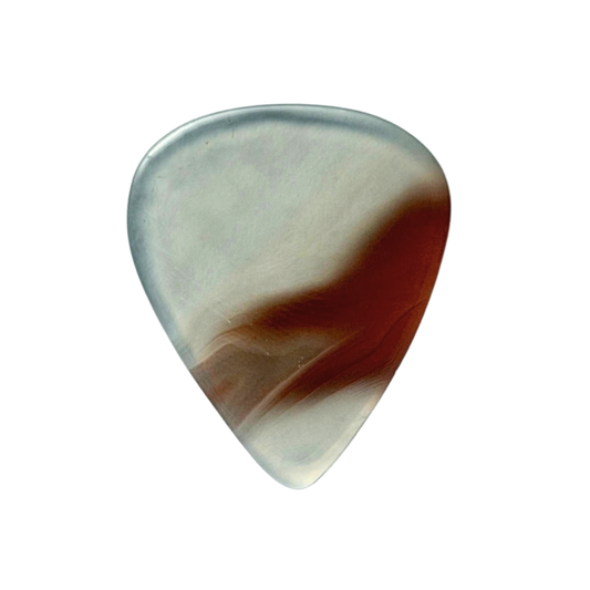 A handmade standard guitar pick with a marbled pattern of translucent off-white, clear, and deep reddish-brown, isolated on a solid white background.