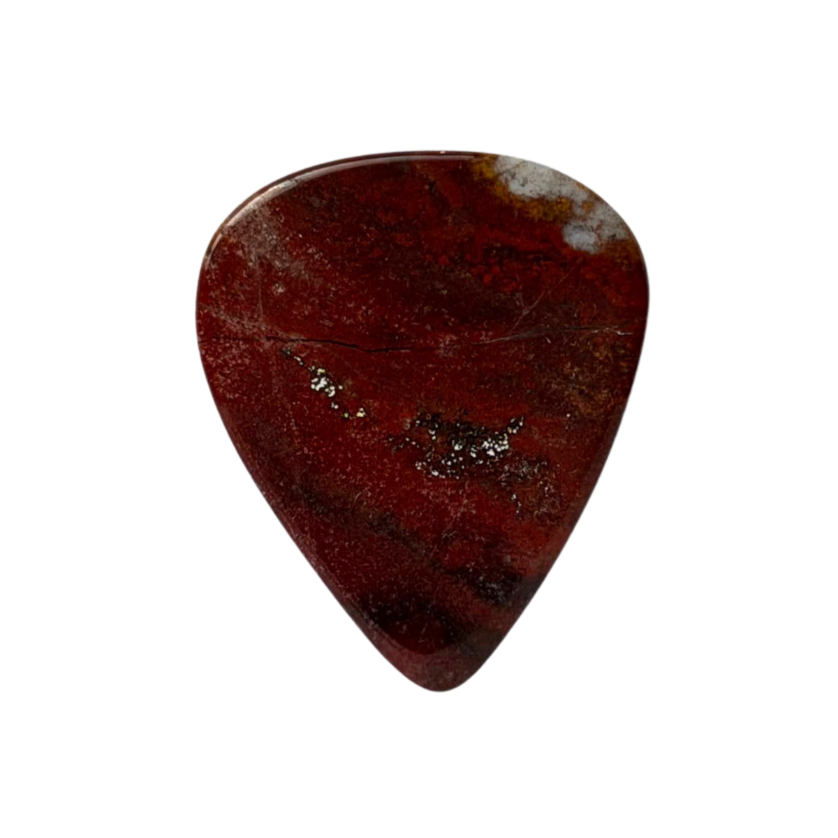 handmade standard stone guitar pick made of polished red jasper stone with natural dark veining and metallic gold flecks, shown on a solid white background.