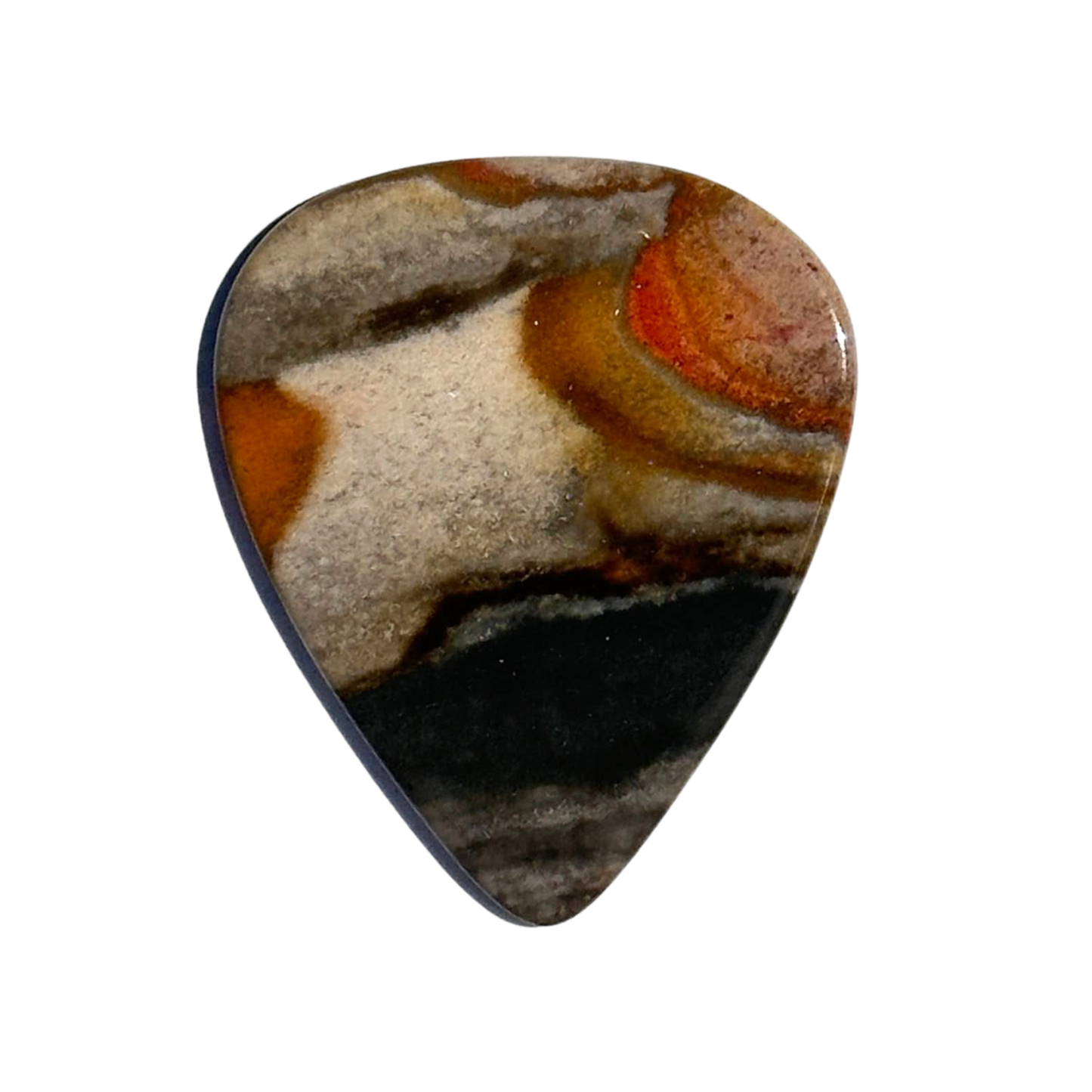 orange toned with gray concentric patterned handmade stone guitar pick on white background