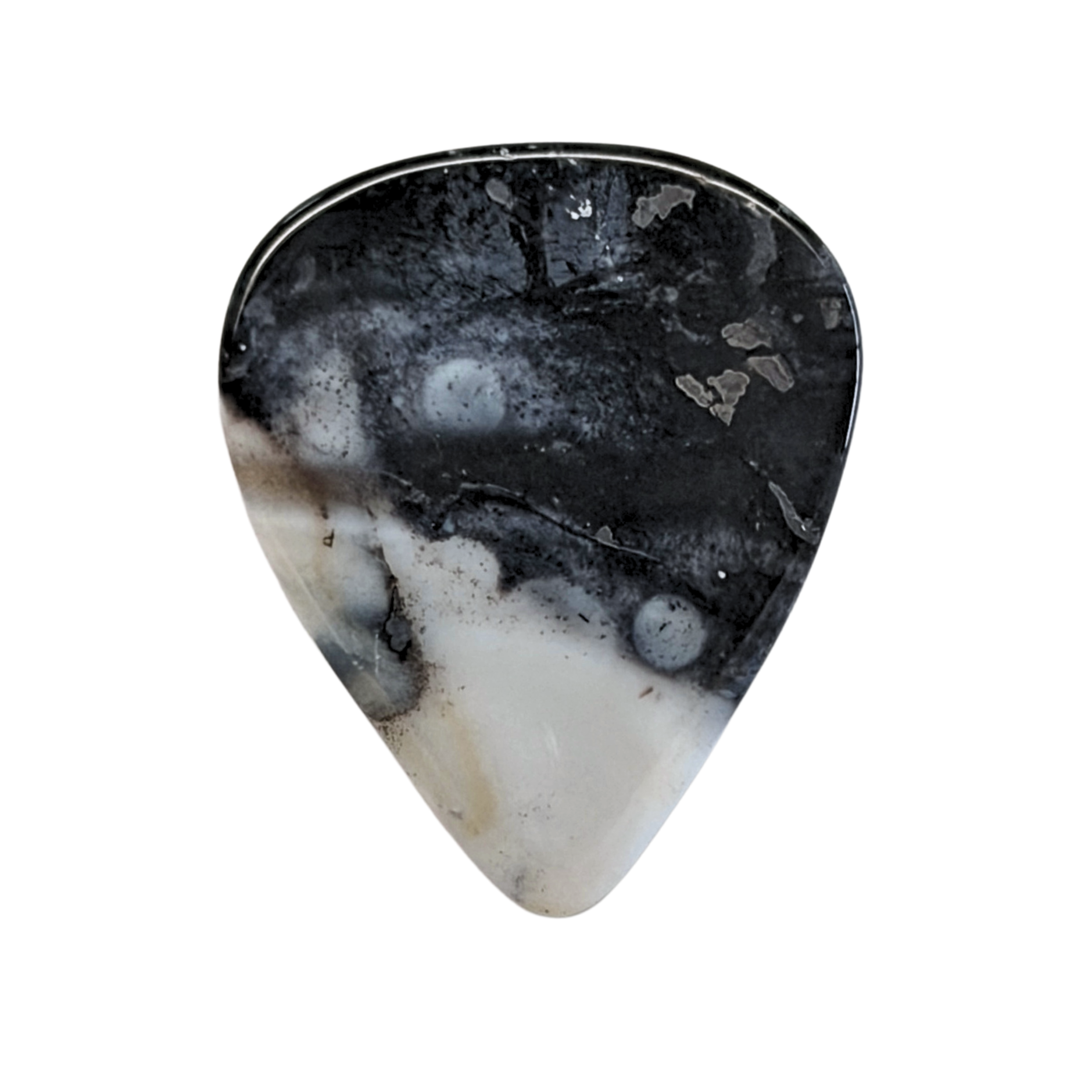 black and white handmade stone guitar pick on white background