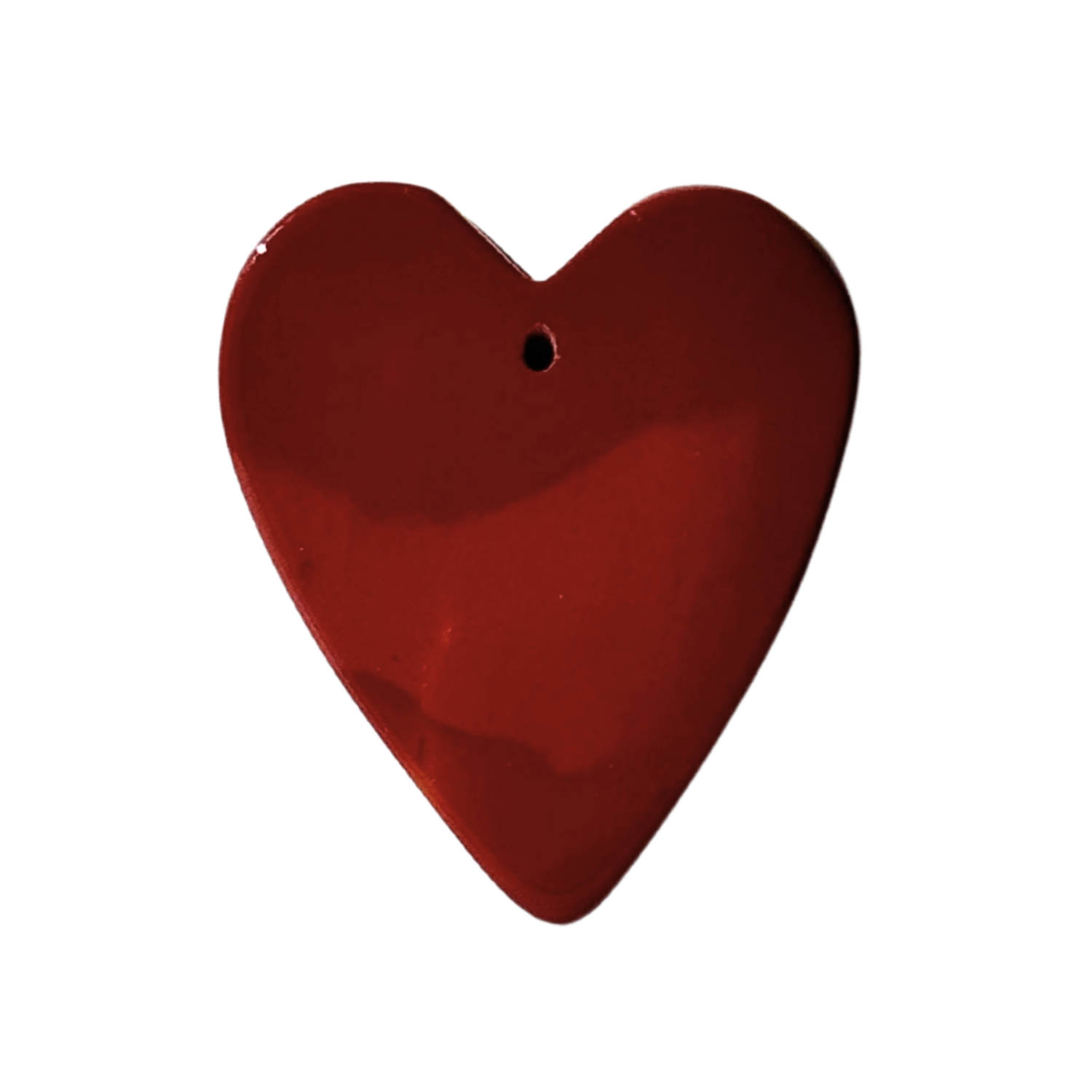 Red heart shaped stone guitar pick with light variation