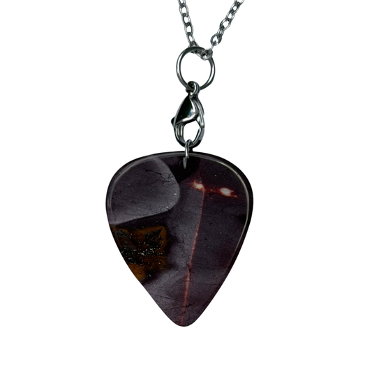 dark purple stone guitar pick necklace on silver chain